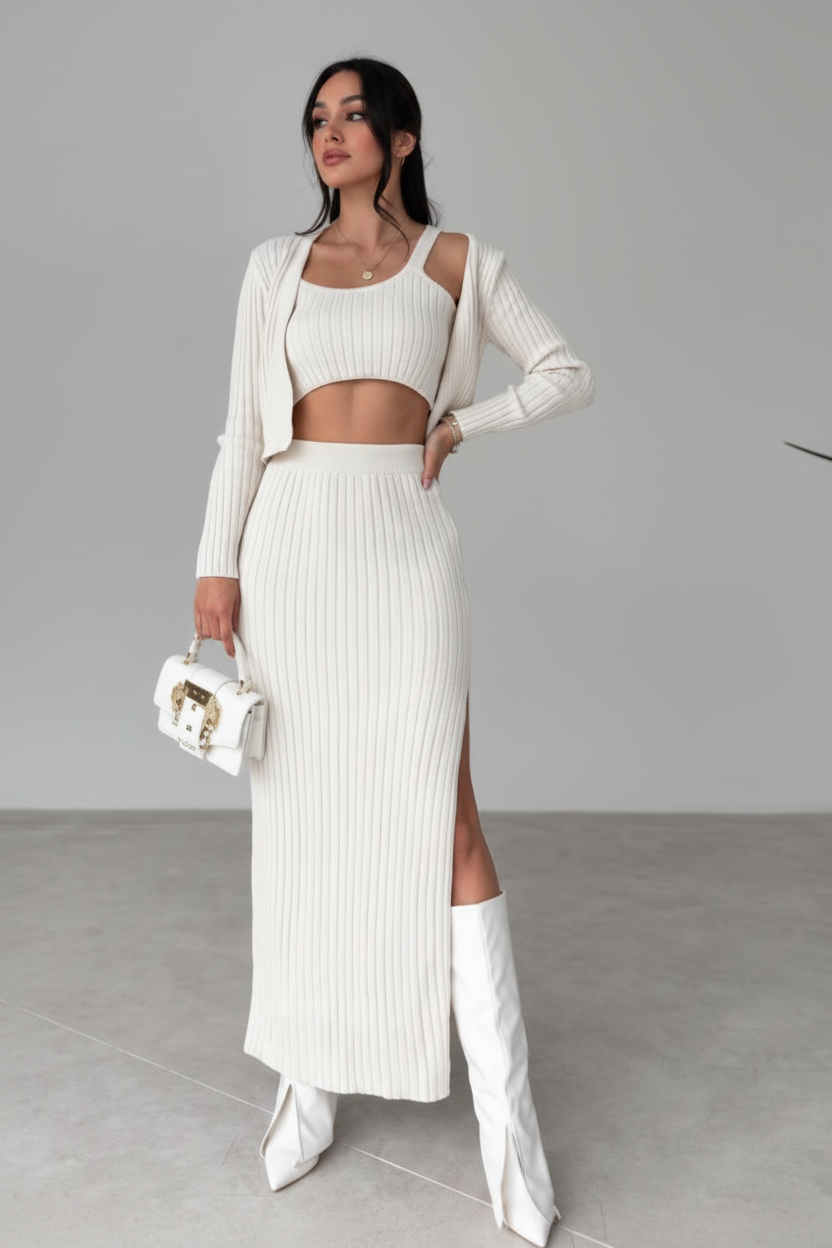 Woman wearing a white outfit with a gray background